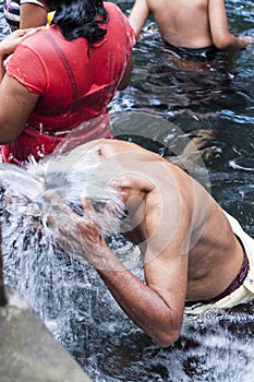 Documentary editorial image. Holy Spring Water Tirta Empul Hindu Temple , Bali Indonesia