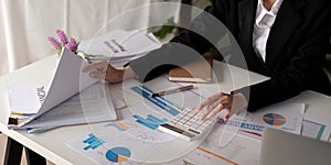 Documents, Business woman and accountant reading report for information, financial data or analysis. Paperwork, auditor