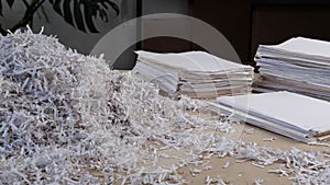 Documents Cut by a Paper Shredder. Shredding Services