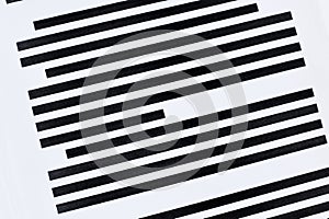 Documents with fully blacked out text.