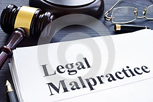 Documents about Legal Malpractice in a court. photo