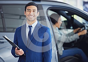 Documents, portrait and car salesman smile at showroom, workshop or workplace. Face, clipboard and Asian person at