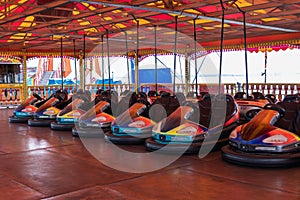 Dodgems or bumper cars lined up at the fairground