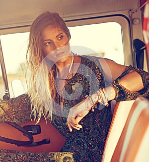 She doesnt live her life in one place. a gorgeous young woman enjoying a roadtrip on her own.