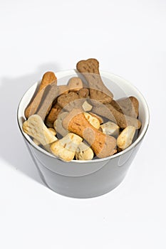 Dog biscuits in a bowl.