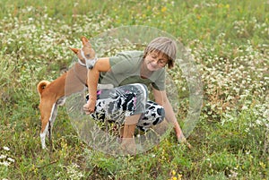 Dog bites master while playing outdoors