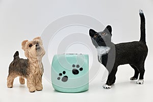 A dog and a cat miniature figurines toys