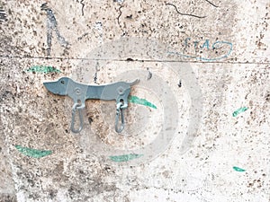Dog Daschund shape metal on white wall