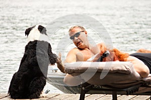 Dog greets boater photo
