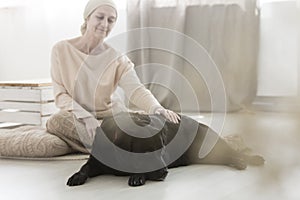Dog helping woman with cancer