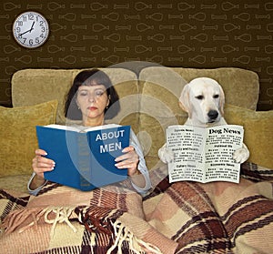 Dog labrador with his owner are reading