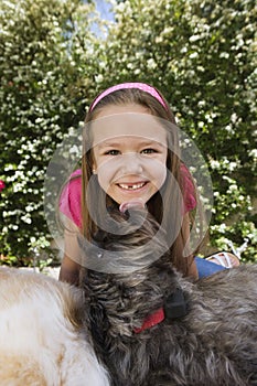 Dog Licking Little Girl's Chin