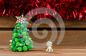 Dog looking Christmas tree