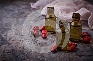 Dog rose essential oil on small bottles