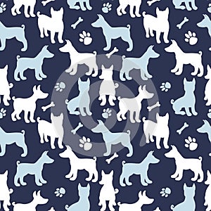 Dog silhouette seamless pattern. Winter animal design surface texture about dogs. Vector illustration shape on dark blue