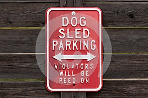 Dog sled parking â€“ Violators will be peed on