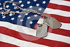 Dog tags on american flag