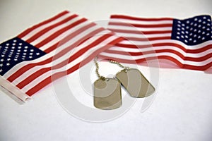 Dog Tags and American Flags on white background