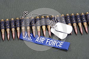 dog tags and ammunition belt on US AIR FORCE uniform