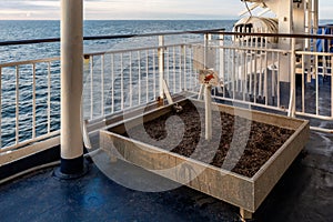 Dog toilet on the deck of ferry