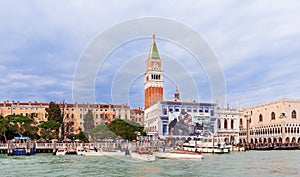 Doge\'s Palace, Campanile and water taxis in Venice in Veneto, Italy