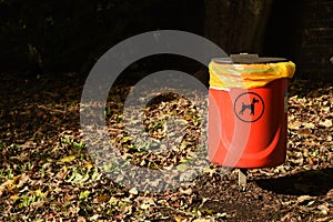 Doggy poo bin situated in a park