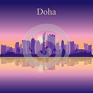 Doha city silhouette on sunset background photo