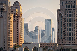 Doha, Qatar, cityscape of modern but still oldschool buildings during sunset