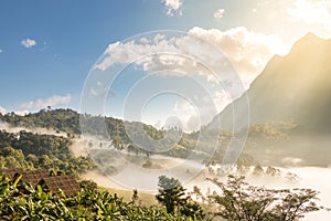 Doi Luang Chiang Dao mountain with sunrise and fog