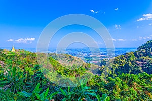 at Doi Pha Mee view point you can see Doi Nangnon in Maesai Chiang Rai shape of mountains look like women sleeping photo