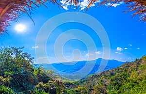 at Doi Pha Mee view point you can see Doi Nangnon in Maesai Chiang Rai shape of mountains look like women sleeping photo