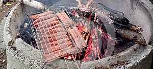 doing grilled meat on barbecue