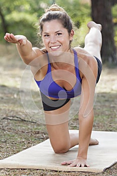 she doing yoga in forest