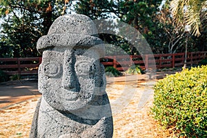 Dol hareubang stone grandpa sculpture at Daepo Jusangjeolli park in Jeju Island, Korea