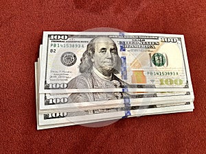 100 dolar bills close up shot photo