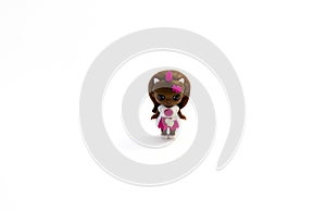 doll black, african american, negroid girl on a white background, isolated object