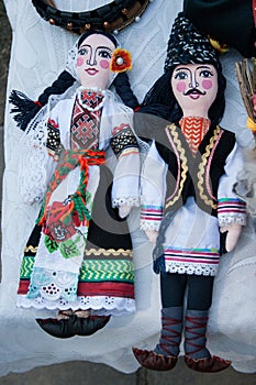 Doll couple in traditional Moldovan clothes photo