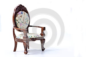 Doll house interior - armchair isolated on white background