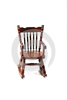 Doll house interior - rocking chair isolated on white background. Vertical image