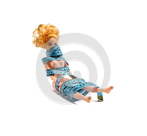 Doll with measuring tape