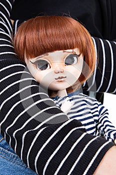 Doll red hairs in child girl hand toy fashion realistic scary plastic game