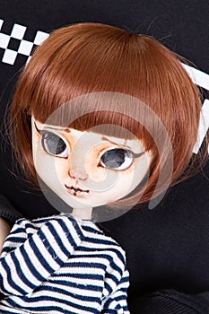 Doll redhead hair face expressive with big eyes portrait looking girl childhood toys