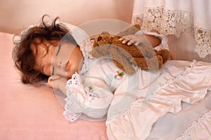 Doll Sleeping with Teddy Bear