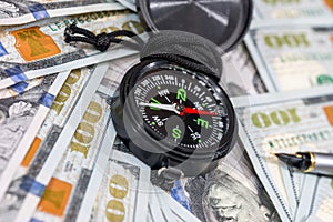 dollar banknotes with compass. close up.