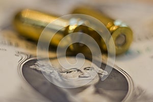 Dollar bill and ammo