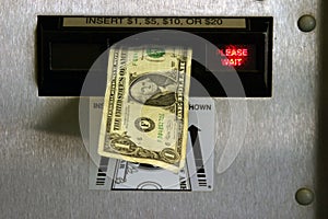 Dollar bill in a change machine