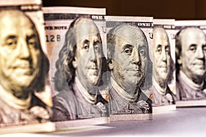 100 dollar bill, the gaze of Benjamin Franklin, vertical location close-up
