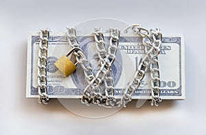 Dollar bills with chain and padlock, Safety money and investment concept