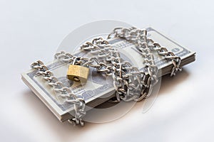 Dollar bills with chain and padlock, Safety money and investment concept