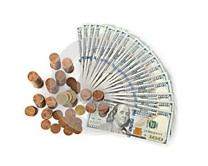 Dollar bills and coins isolated on white
